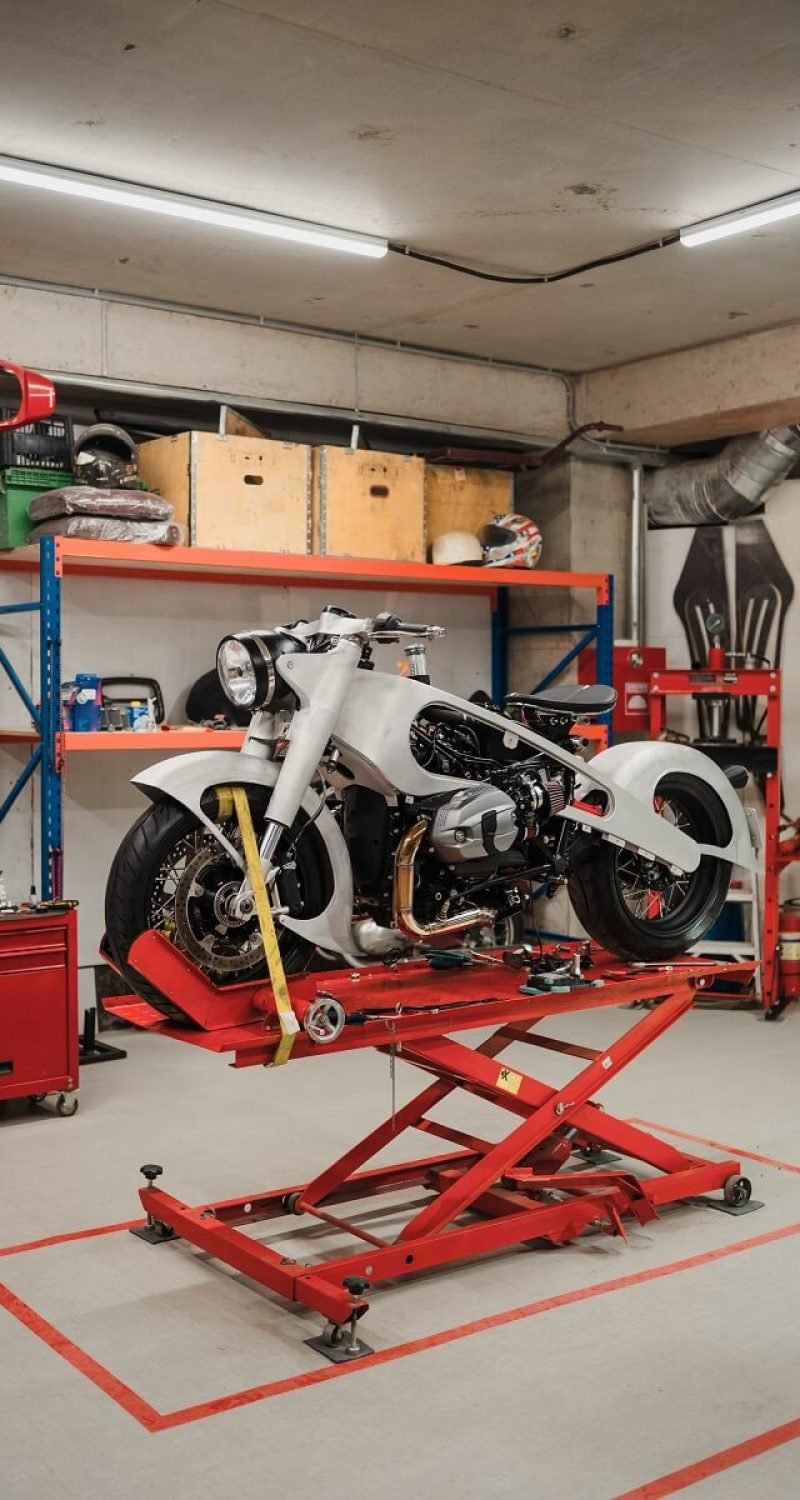 custom-motorcycle-standing-in-repair-shop-2553TAX.jpg